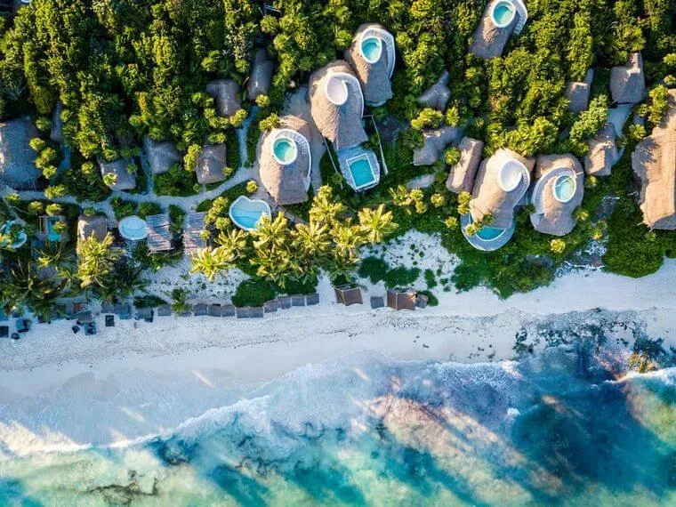Round-roofed beach houses from above